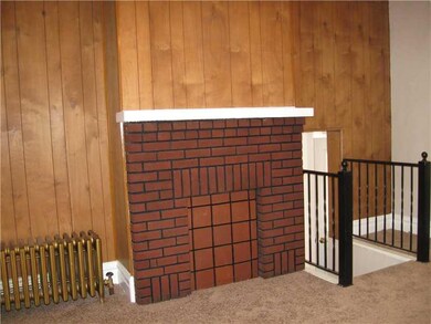 Living Room. 154 - Decorator Fireplace with new ca