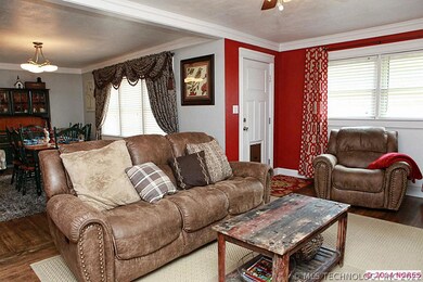 Living room opens to formal dining room