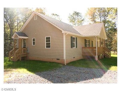 Exterior Front - The home features a large front p