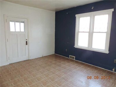 Living Room. There is also a door fron the front p
