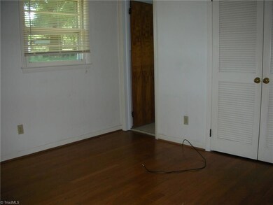 Turning around you are now looking at the door to the master bath from the master bedroom area. You can also notice the double door closte