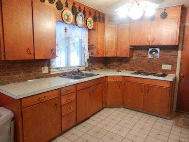 Large kitchen with abundance of cupboards and coun