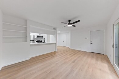 This photo showcases a bright, open-concept living