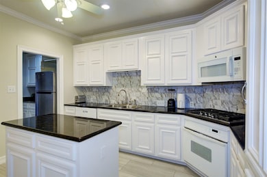 Kitchen full equipped with appliances
