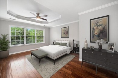 Primary Bedroom With A Tray Ceiling, Private Ensui