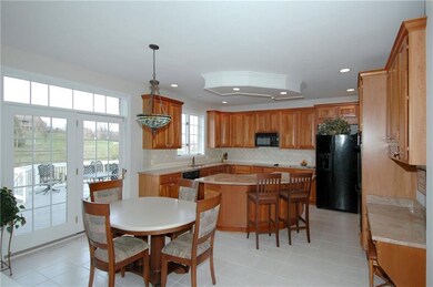 Kitchen - Informal dining area with door to the hu