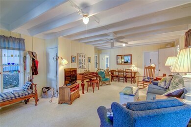 Cheery living room with plenty of gathering space,