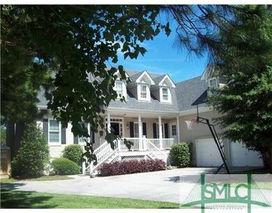 Exterior Front. Large Shade Trees provide a Super 