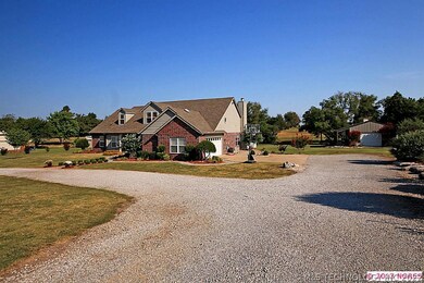 Situated on almost 2 acres with a matching worksho