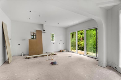 Gourmet quality Kitchen with open arch to living a