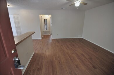 Spare room with visible vents, a textured ceiling