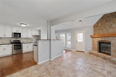 Dining room and hearth room with 2nd fireplace and