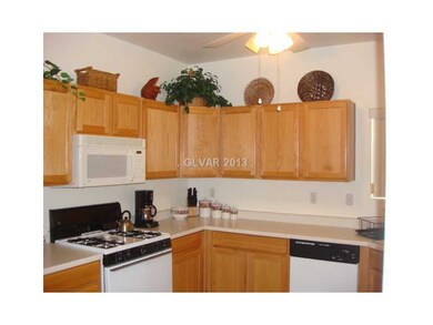 Kitchen. Step-saver kitchen has plenty of cabinets