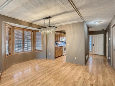 Dining area with a beautiful chandelier.