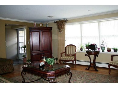 Living Room. THE NATURAL LIGHT POURS IN THROUGHOUT