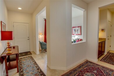 Enter through front door into hallway looking into