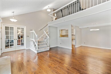 living room looking above to lofts