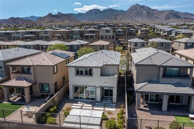 Birds eye view of property with a mountain view an