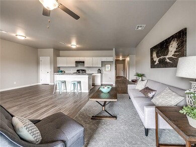 Living Room - A ceiling fan is already in place in