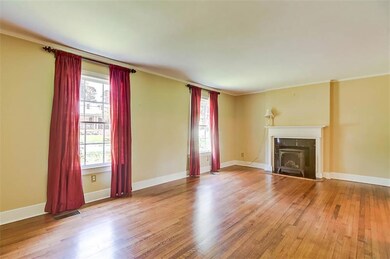 Formal Living Room has the original decorative fir