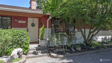 Expertly landscaped in front and back!