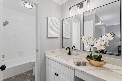 Full bath with washtub / shower combination, toile