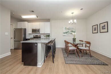 Living room view into the kitchen and the dining a