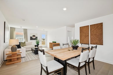 (*Photo of actual model home) Another view of the eat-in dining space