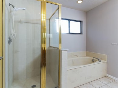 Master Bathroom with Separate Shower and Tub