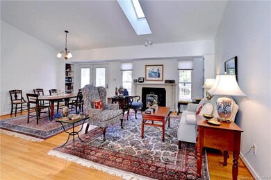 Open Living area - hardwood floors vaulted ceiling