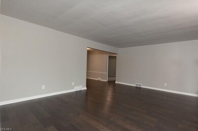 Gorgeous new wood flooring adds a luxurious feel t