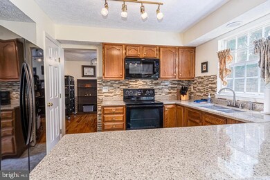 7907 Galloping Cir, Windsor Mill, MD 21244 - photo 5