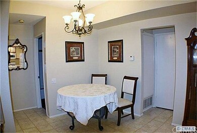 Dining area opens to kitchen and living room