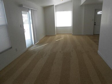 Living Room. Plenty of natural lighting with many 
