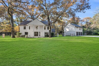 Main house w. 3 car garage and full sized apartment on the 2nd floor.