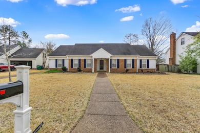 View of front of house featuring a front yard and 
