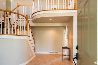 Stairs featuring baseboards and tile patterned flooring