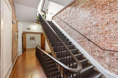 Well-maintained building showing the interior steps to the unit