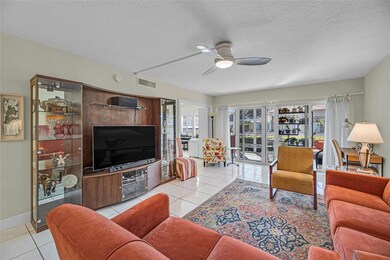 Large and spacious living room with tile flooring