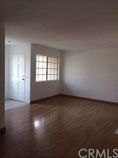 Front door entry into Open family Living area on First floor. 