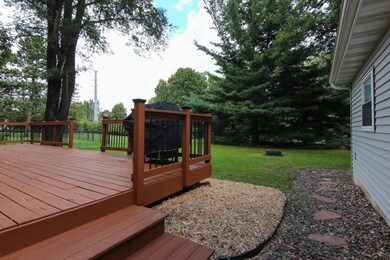 View of backyard, the walking trail is on the othe