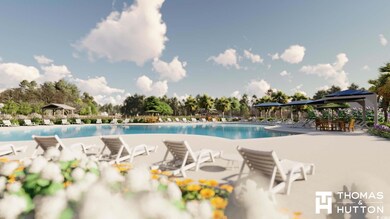 Community pool featuring a patio