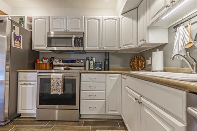 Kitchen featuring appliances with stainless steel 