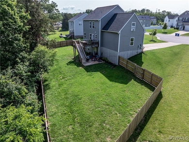Fenced backyard with stairway, a residential view,