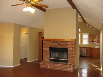 View of fireplace in the living room.  Sneak peak