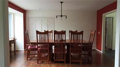 Dining room features a wet bar just beyond the clo