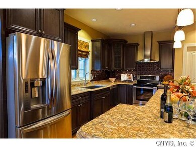 Kitchen. The cherry cabinets in this gourmet kitch