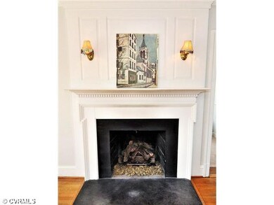 Other - Gas fireplace with sconces and woodwork.
