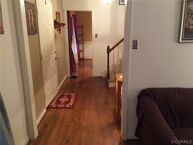 Living Room Opens to Foyer & Formal Dining Room