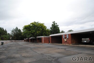 west side and entrance to the 2 car carport